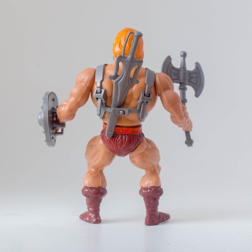 Top Toys He-Man (2nd Edition, Orange Hair) - Back View